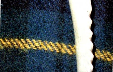 A shoehorn used for putting on a shoe more easily